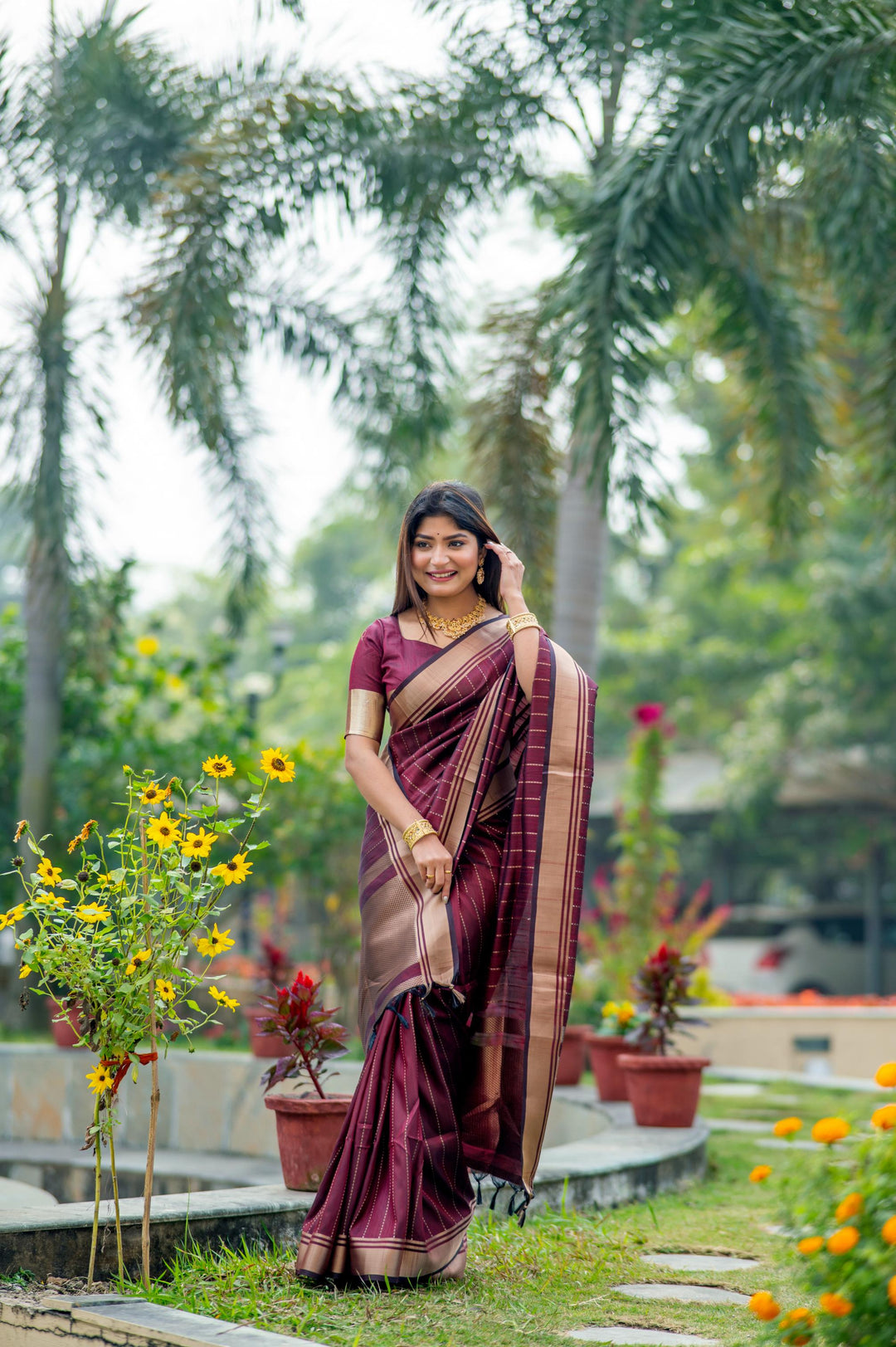 Luxurious purple Banarasi saree with detailed zari pattern, ideal for festive events and cultural celebrations.