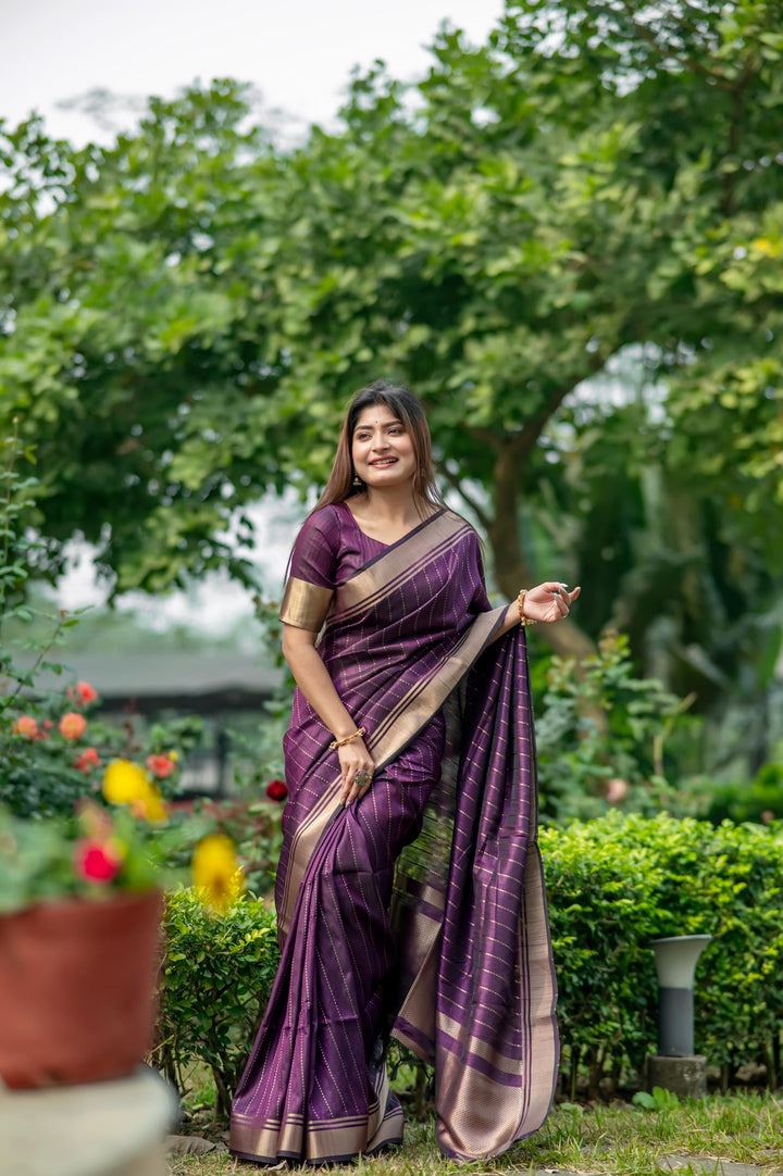 Lovely sea-blue Banarasi saree with intricate zari patterns, ideal for festive wear and special occasions.