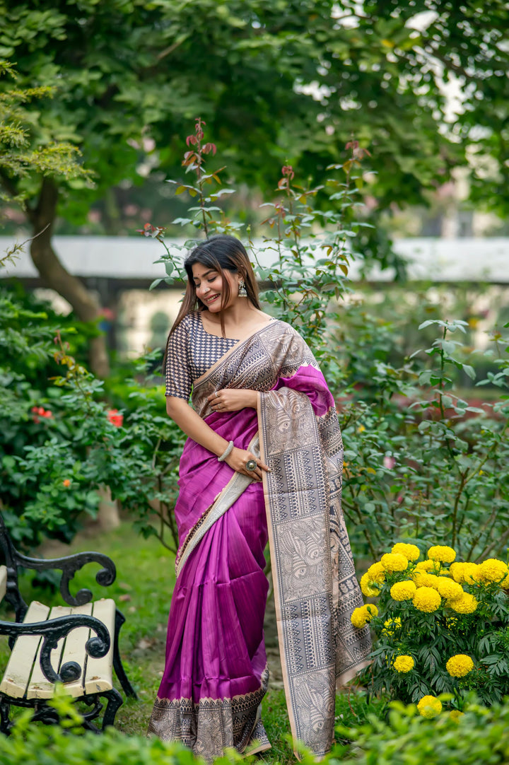 Gorgeous olive soft tussar silk saree with intricate Madhubani prints and playful tassels, perfect for weddings.