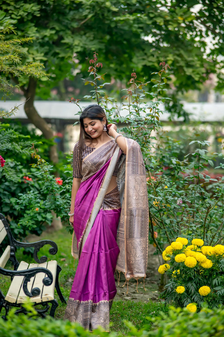 Stylish olive soft tussar silk saree with beautiful Madhubani prints and chic tassels, ideal for cultural celebrations.