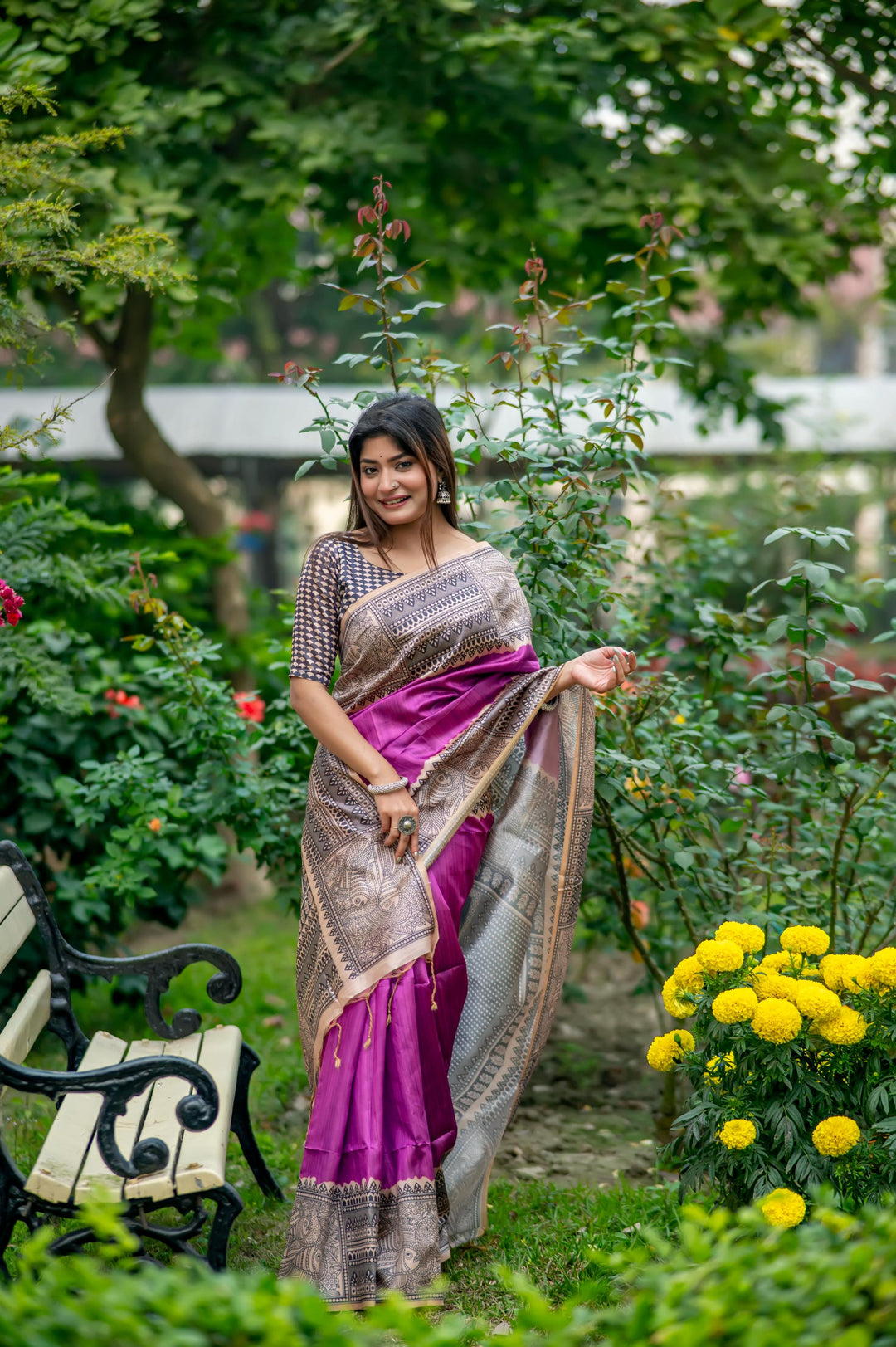 Elegant blue soft tussar silk saree featuring intricate Madhubani prints and delicate tassels, perfect for bridal wear.