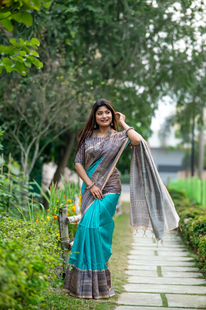 Rich blue soft tussar silk saree with intricate Madhubani prints and elegant tassels, perfect for cultural celebrations.