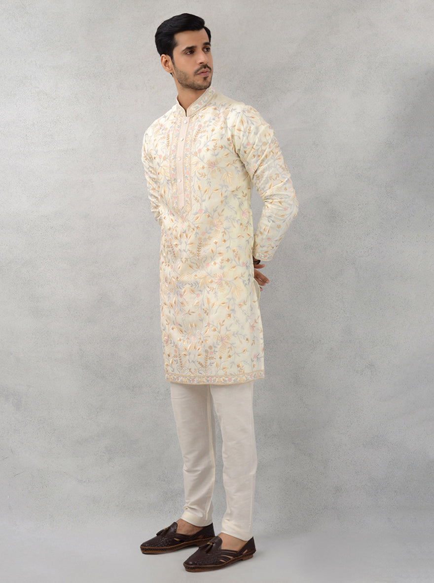 Designer cream kurta ensuring comfort and charm.