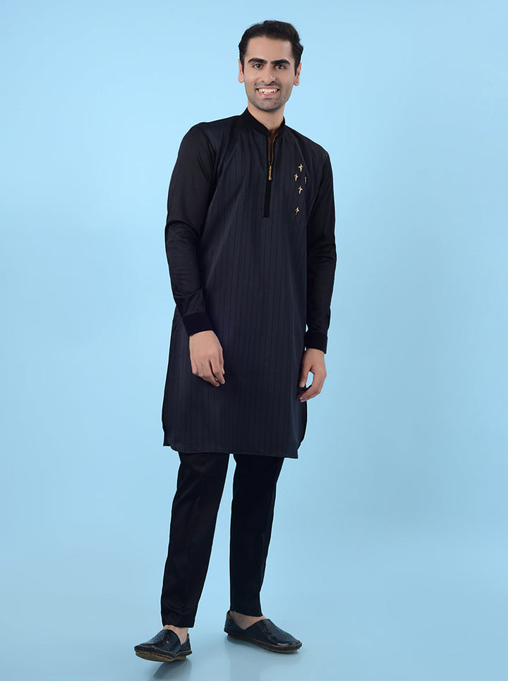 Men's black kurta set, featuring a regular fit and zipper closure for a modern twist on ethnic wear.