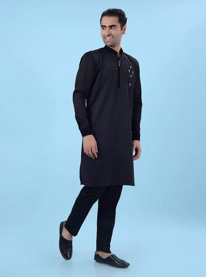 Black kurta for men with zipper closure, offering a modern regular fit for traditional events.