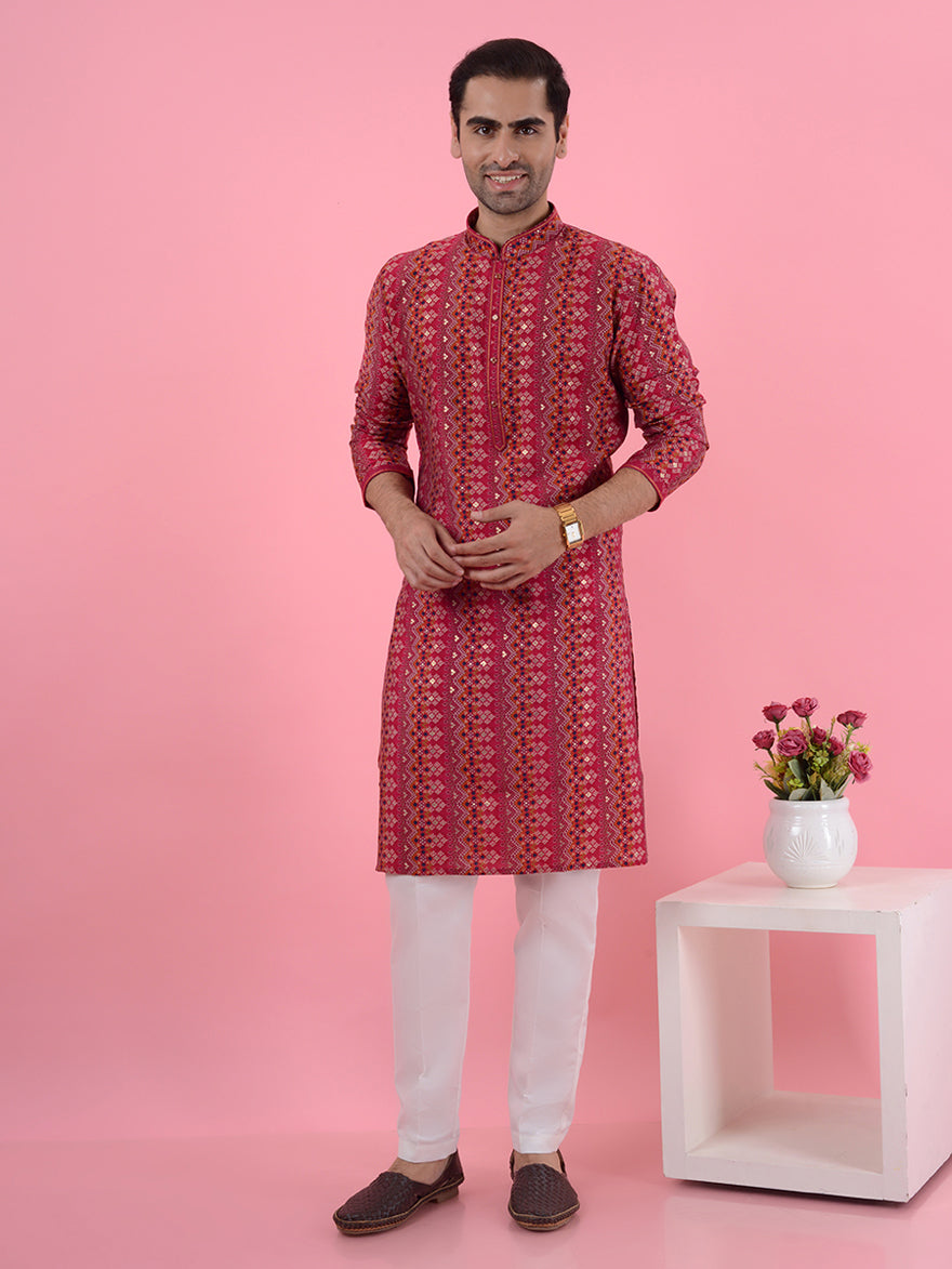 Celebrate in style with this stunning red printed kurta, blending tradition and modern flair seamlessly.