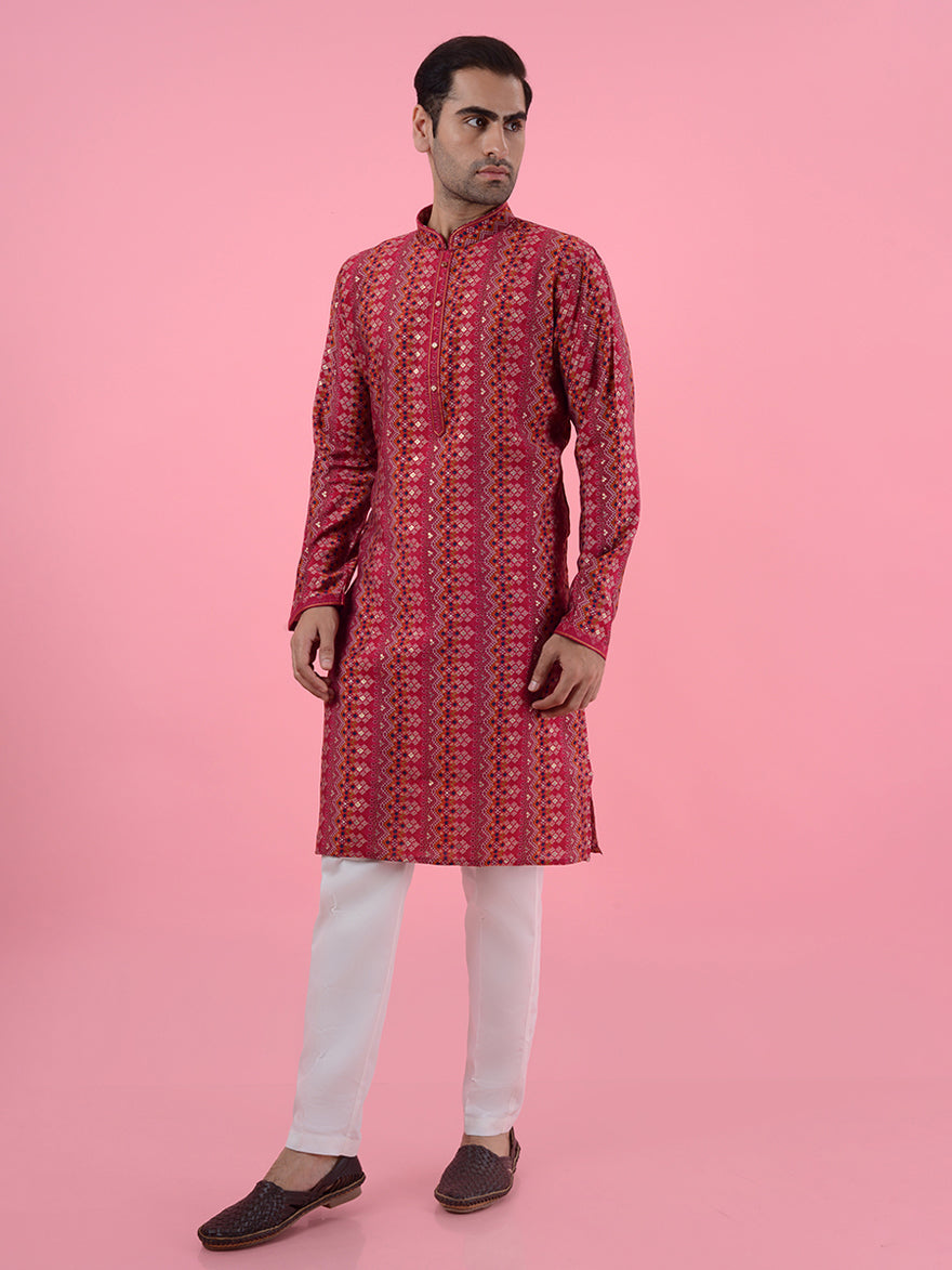 Elevate your ethnic collection with this red silk kurta pajama, perfect for capturing attention at events.