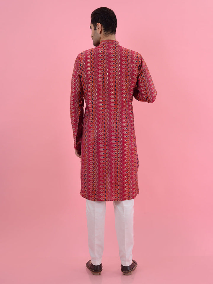 Shine at pooja celebrations with this luxurious red kurta pajama, combining comfort with sophistication.