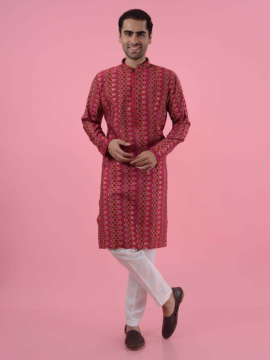 Discover the charm of this red silk blend kurta pajama, designed to enhance your festive wardrobe in the USA.