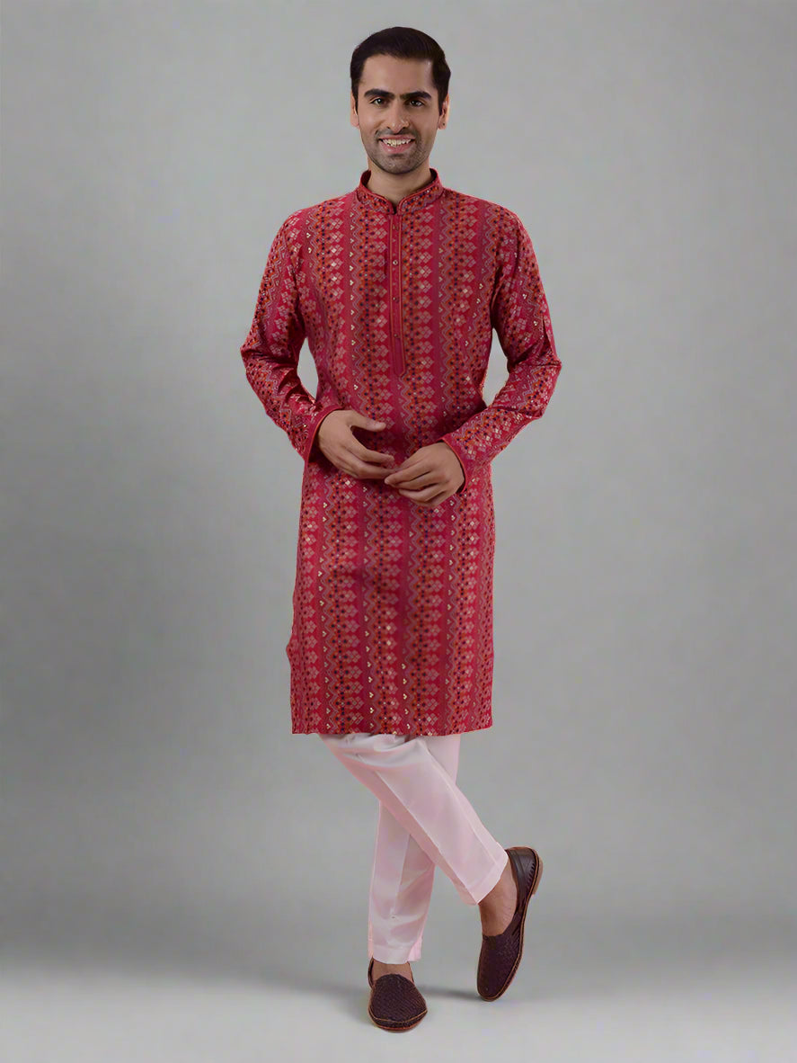 Traditional red kurta pajama set for men, with beautiful embroidery for ethnic occasions.