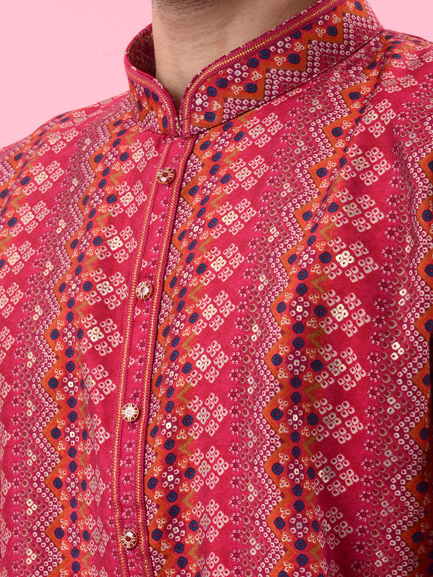 Stylish men's red kurta pajama set with embroidery, designed for festive and traditional wear.