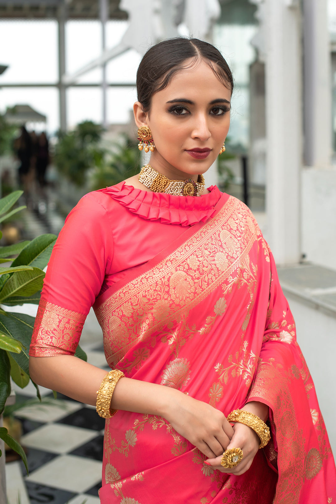 Gorgeous Soft Banarasi Katan silk saree with silver and gold zari weaves and tassel border.