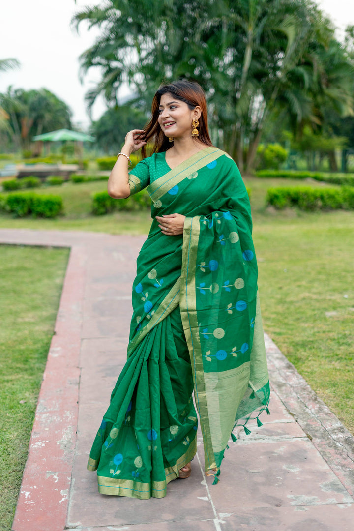 Elegant yellow pure linen silk saree featuring a beautiful Jamdani border and brocade blouse, perfect for traditional wear.