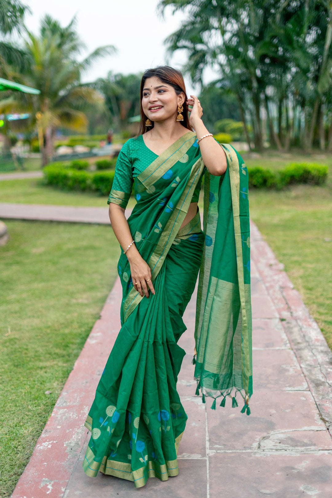 Stunning yellow pure linen silk saree with a rich Jamdani border and luxurious brocade blouse, ideal for festive occasions.