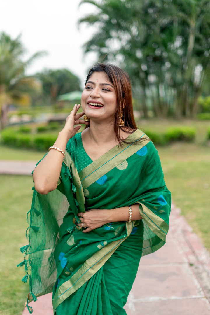 Timeless yellow pure linen silk saree with intricate Jamdani border and a classic brocade blouse, perfect for formal events.