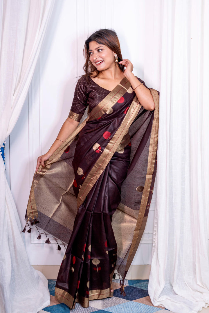 Elegant purple pure linen silk saree featuring a detailed Jamdani border and brocade blouse, ideal for upscale occasions.