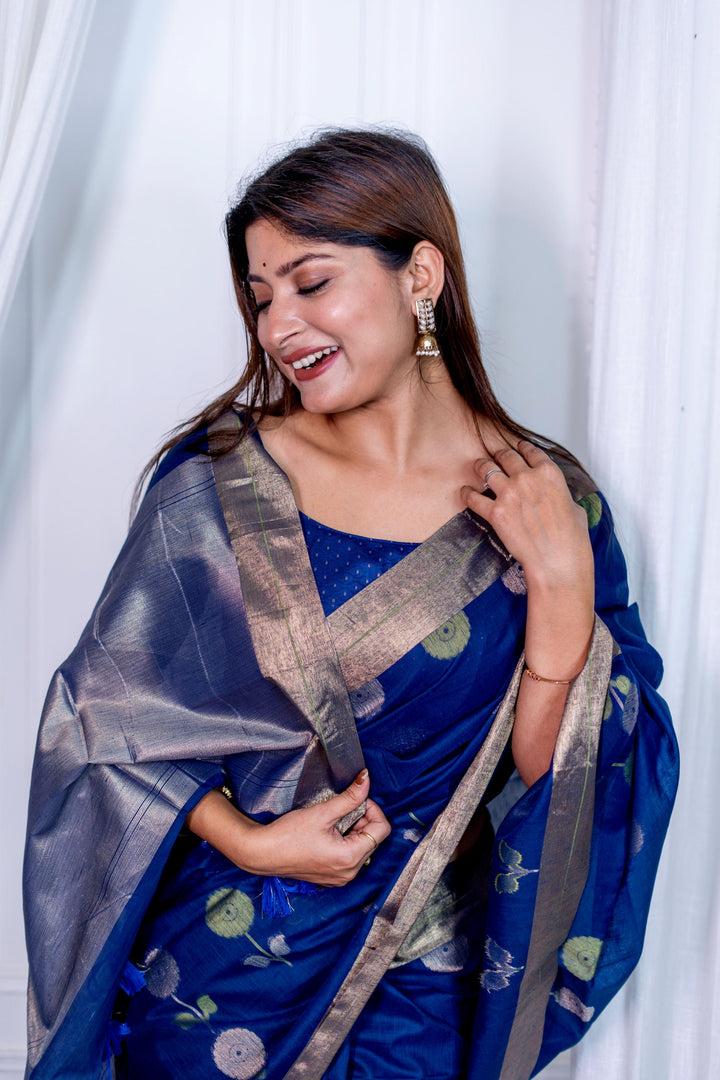 Beautiful brown pure linen silk saree featuring a Jamdani border and brocade blouse, ideal for cultural events.