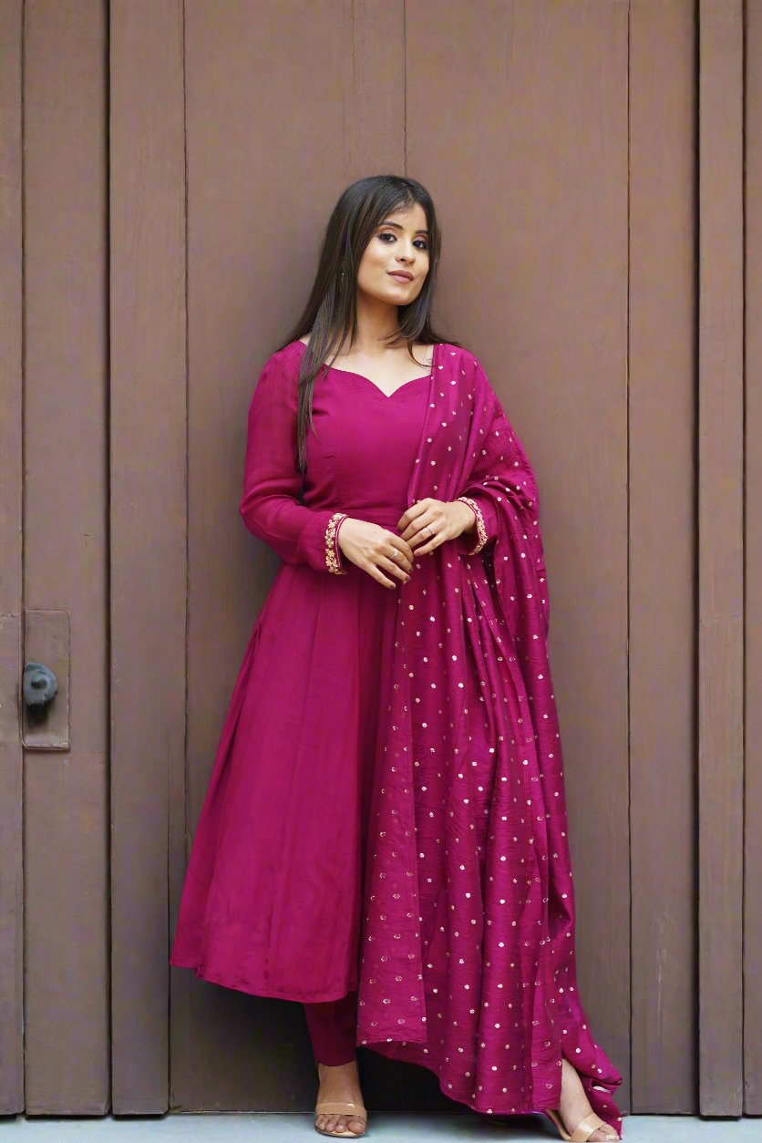 Luxurious burgundy Anarkali suit, blending traditional aesthetics with modern style.