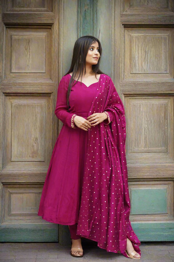 Trendy burgundy Anarkali suit, embodying elegance and grace for any celebration.