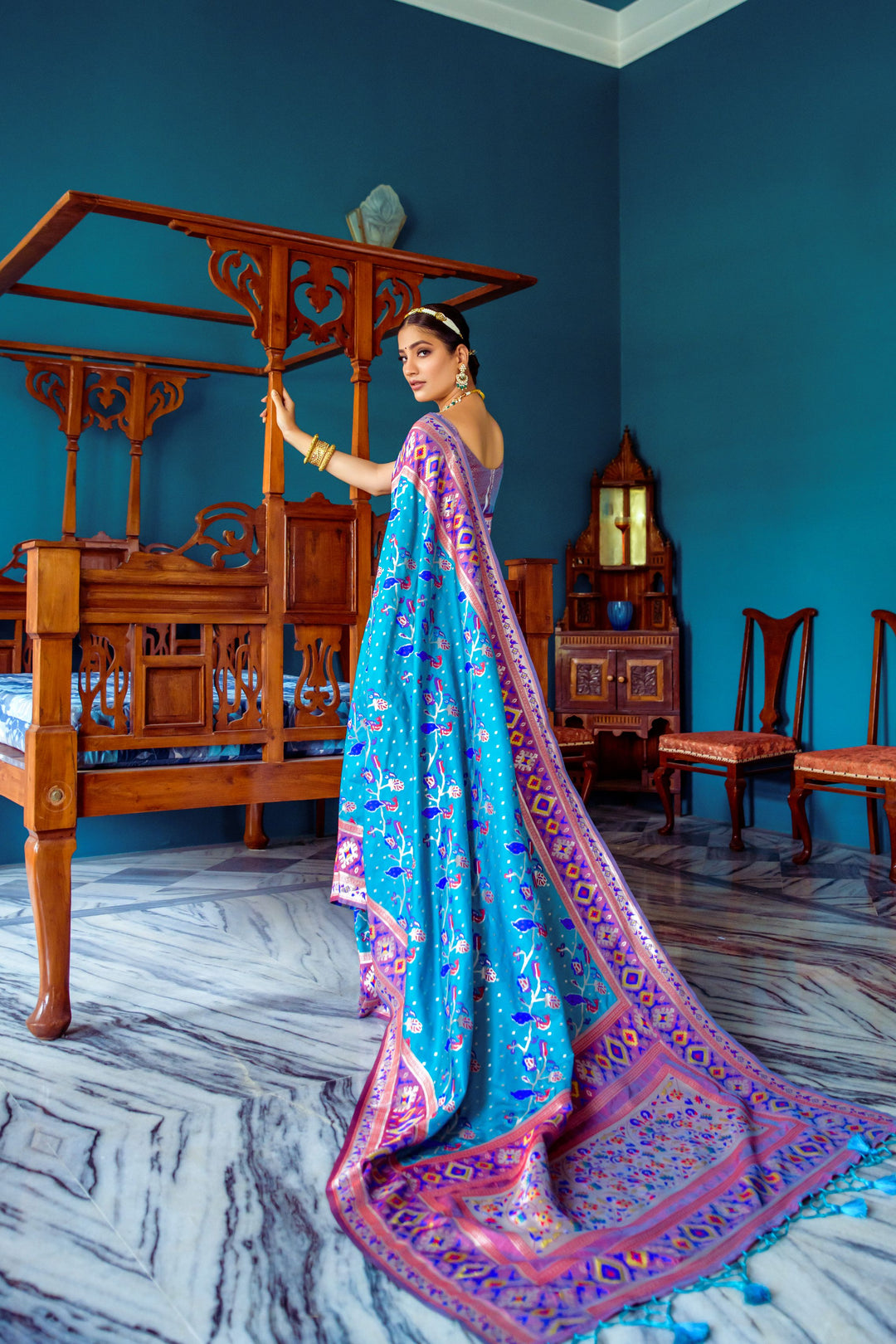 Premium Blue Indian saree with intricate meena and zari weaving, ideal for festive celebrations and cultural events.