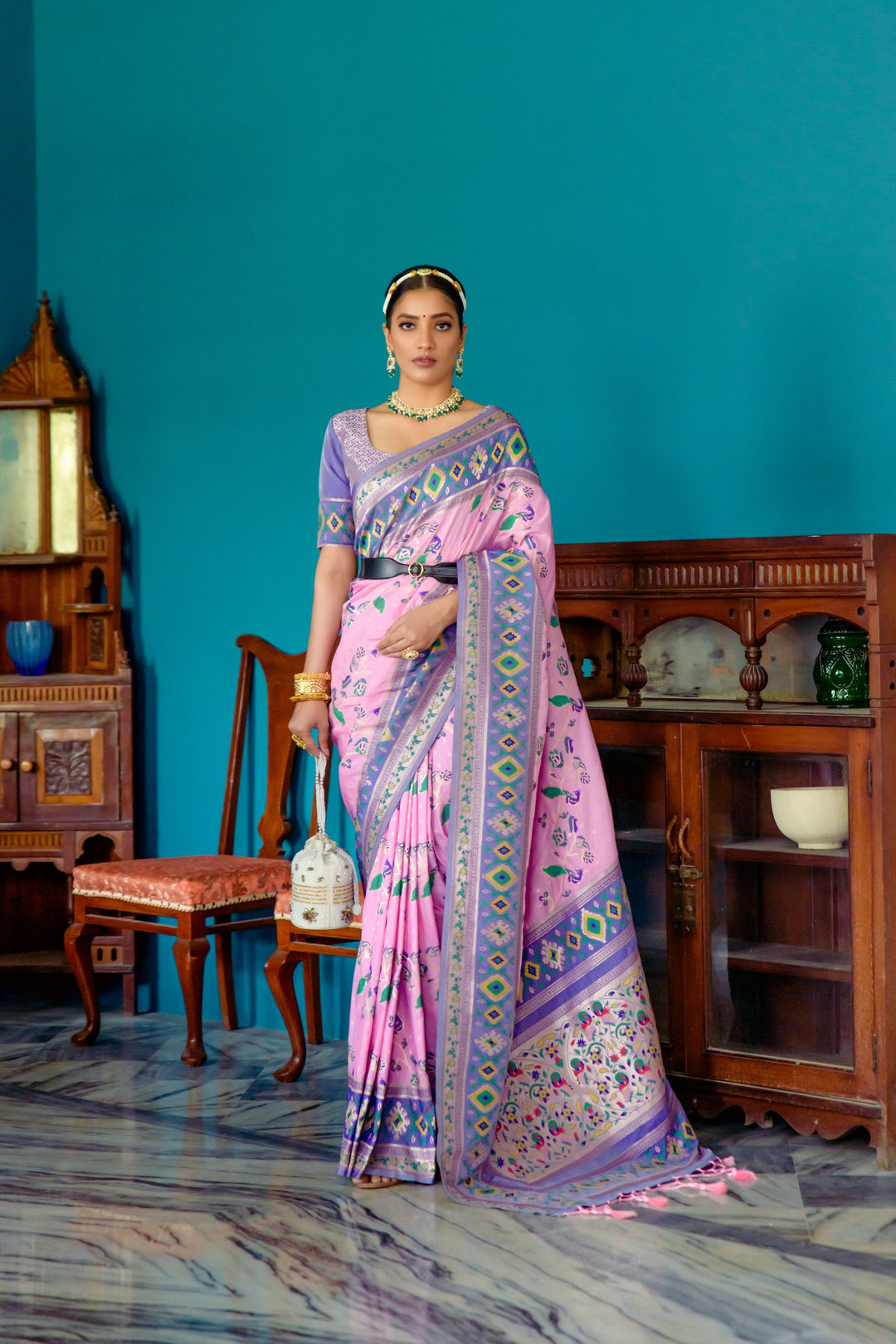 Latest Pink Indian wedding saree with colorful lace border and zari pallu, ideal for a bridal look.