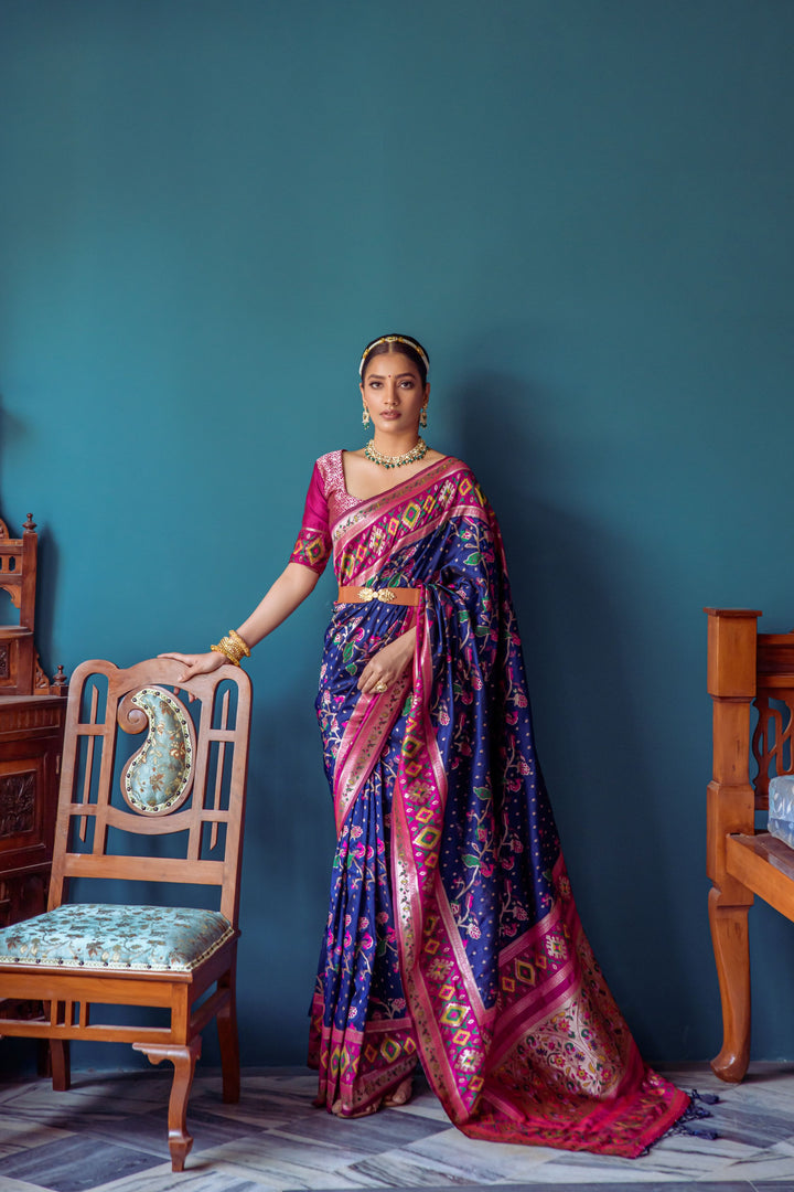 Elegant Navy blue Indian sari with stunning meena and zari weaving, perfect for any formal gathering.