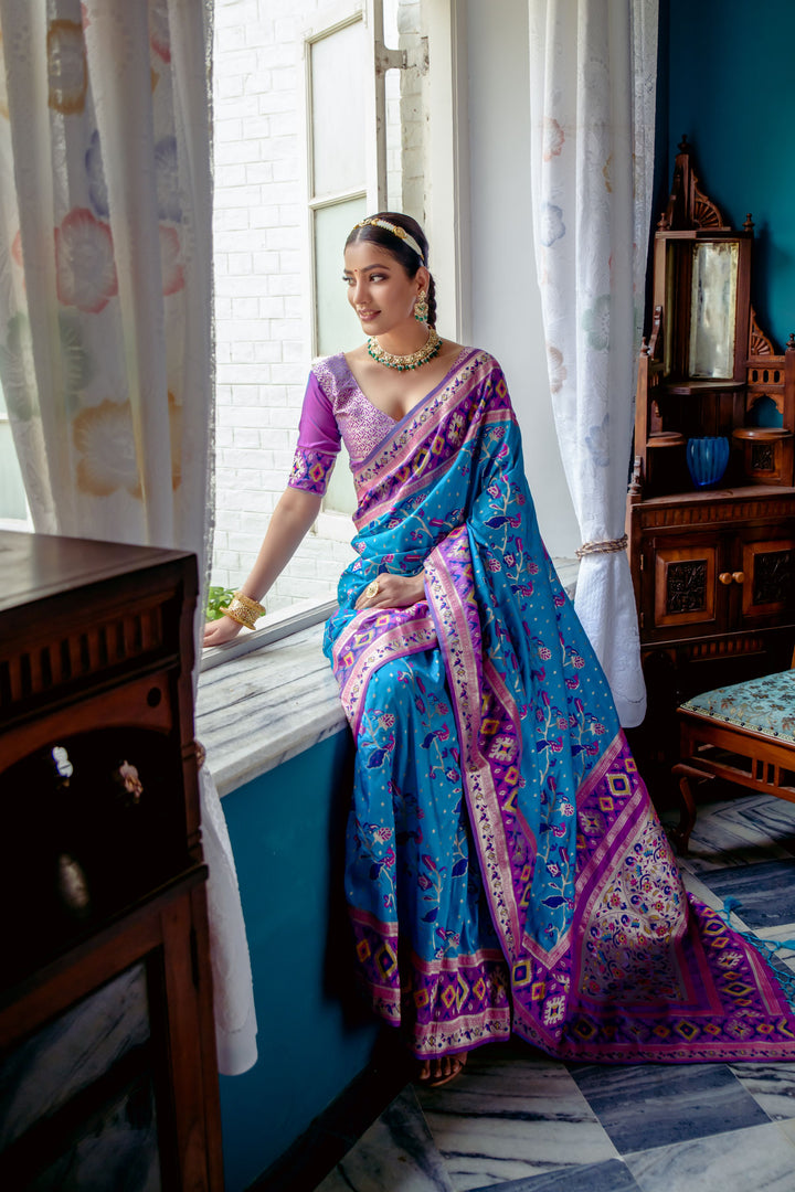 Timeless Blue Indian saadi with colorful lace border and rich zari pallu, perfect for any celebration.