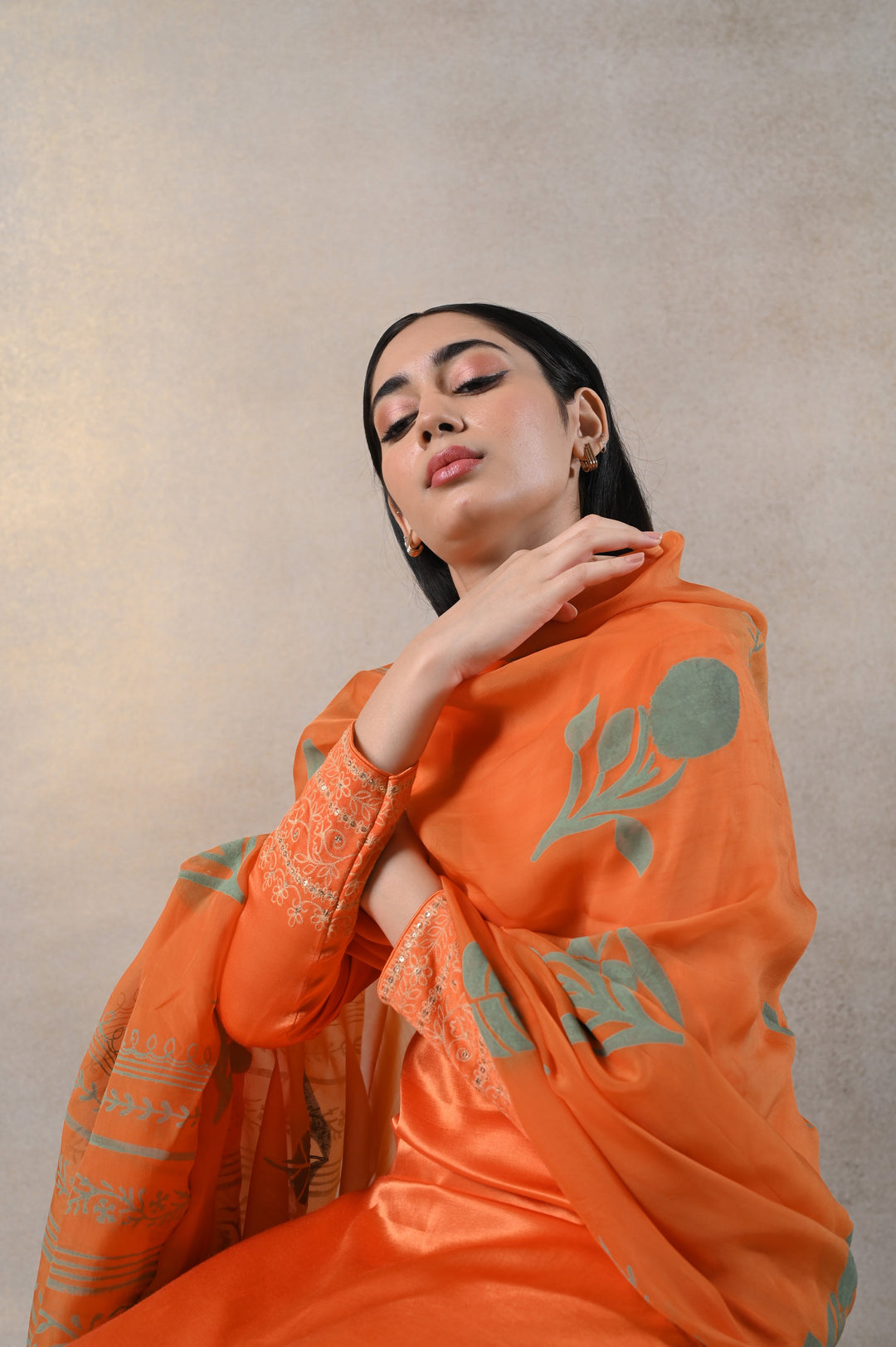 Orange Kamakhya suit set, designed for elegance and comfort, perfect for parties and festive occasions.