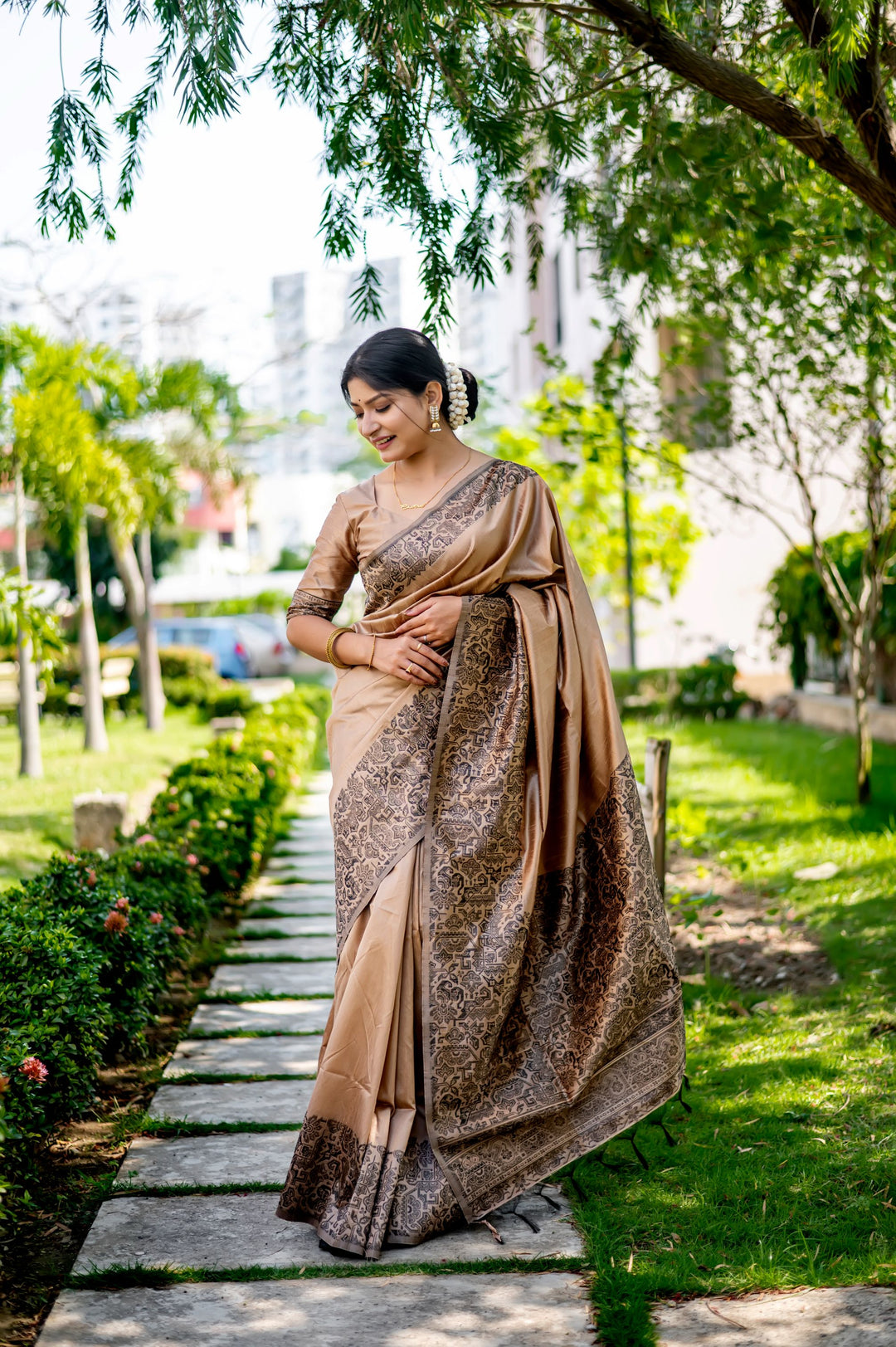 Beautiful rosewood handloom raw silk saree with rich weaving pallu and matching blouse piece, perfect for elegant occasions.