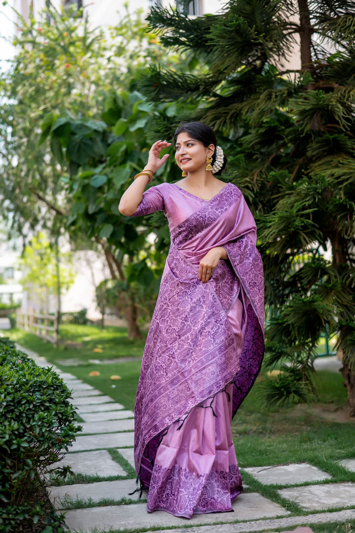 Stunning rosewood handloom raw silk saree with luxurious weaving pallu and blouse piece, ideal for weddings.