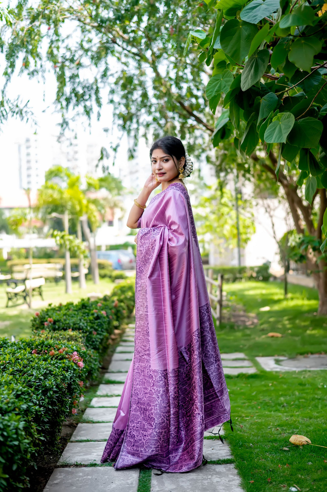 Elegant lavender-dream handloom raw silk saree with rich weaving pallu and blouse piece, perfect for special events.