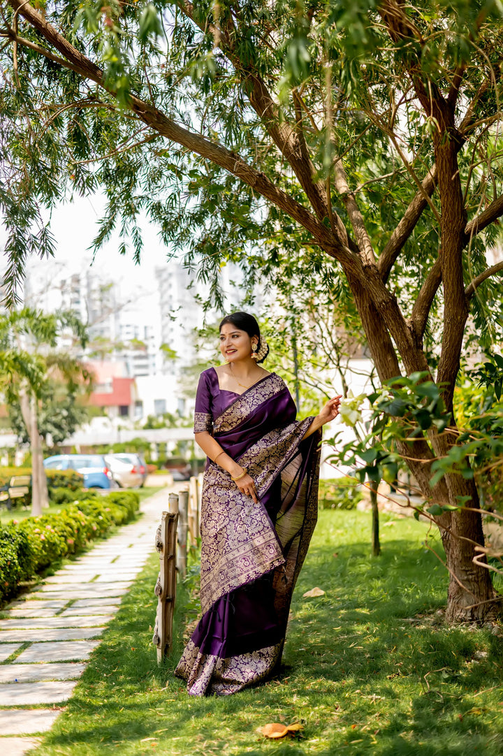 Elegant sea-blue handloom raw silk saree with detailed weaving pallu and blouse piece, perfect for festive gatherings.