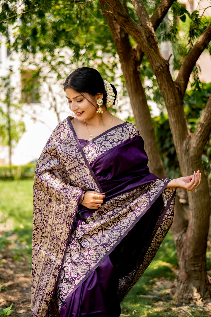 Beautiful sea-blue handloom raw silk saree with intricate weaving pallu and blouse piece, perfect for cultural events.