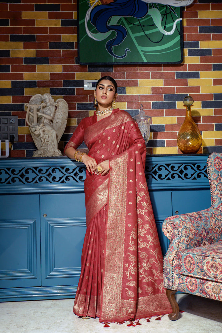 Elevate your festive wardrobe with this crimson red Indian sadi, featuring beautiful zari weaving and a luxurious border.