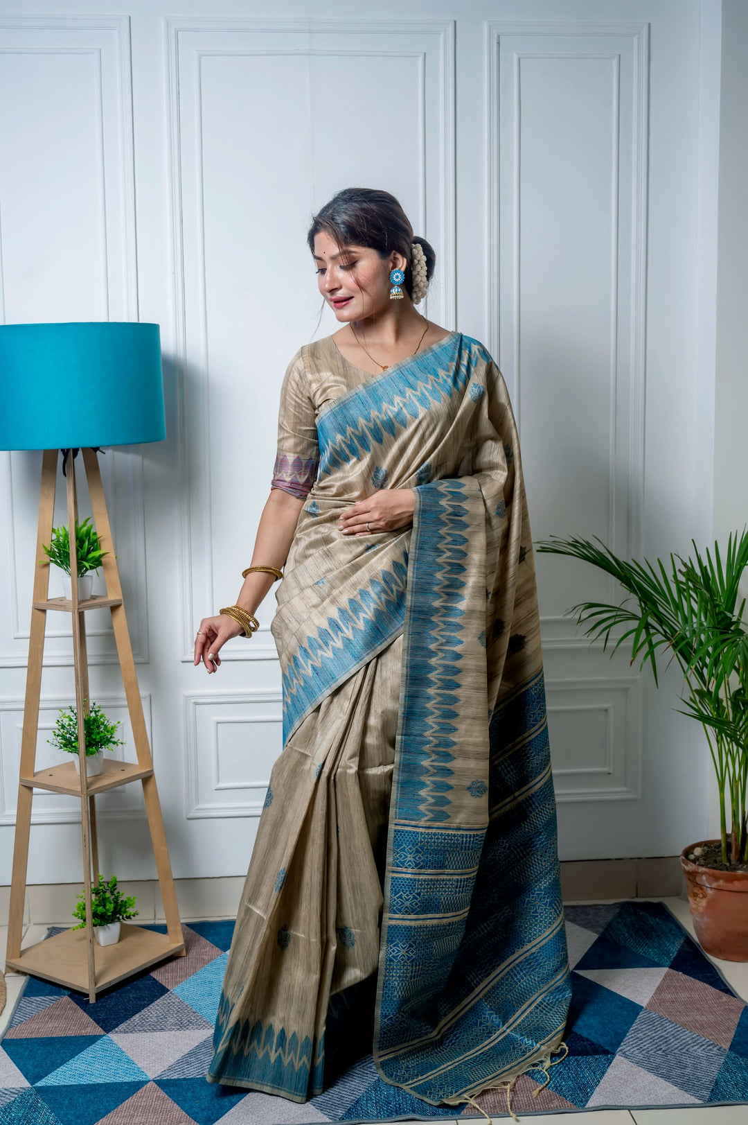 Elegant green Tussar silk saree with delicate all-over weaving and a unique pallu, perfect for weddings.