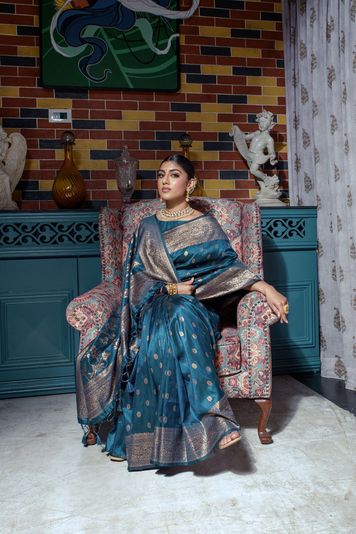 Beautiful Dark blue Indian sari featuring intricate zari work and a luxury border, perfect for weddings and cultural events.