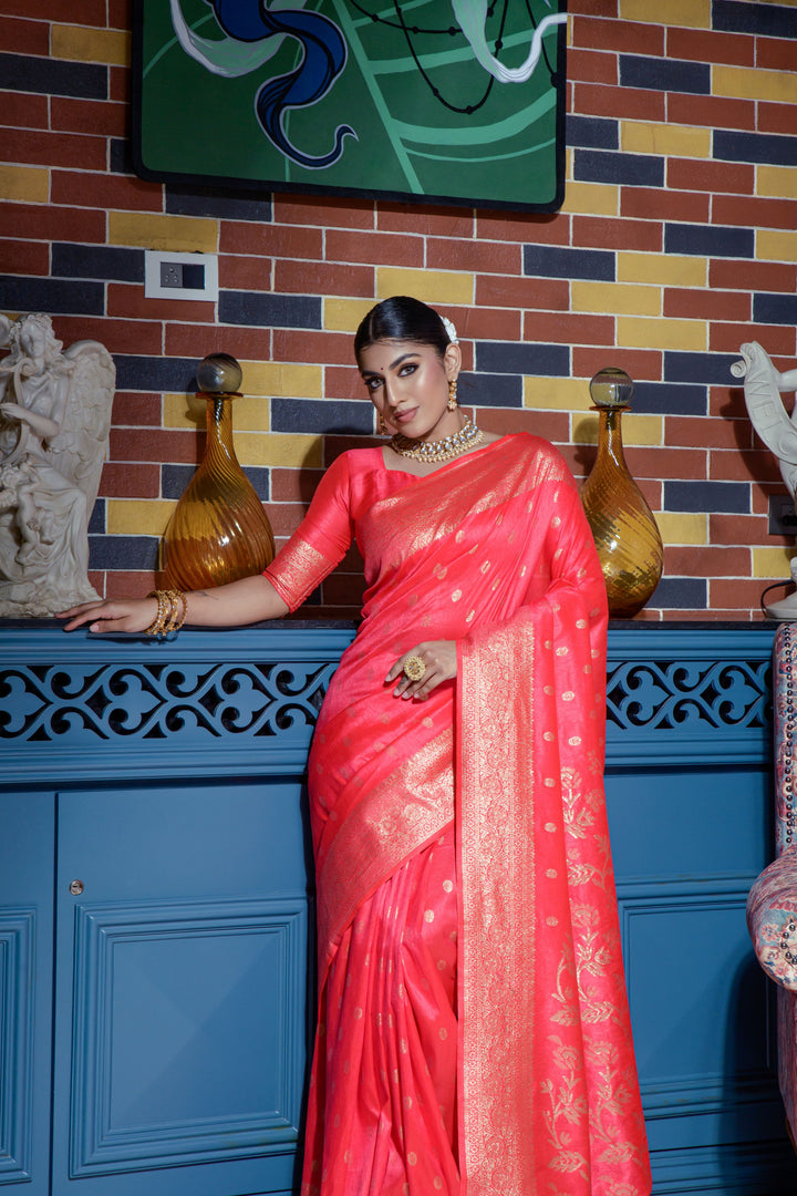 Elevate your look with this Red fancy saree, featuring a traditional zari border and luxury tassels, ideal for weddings.