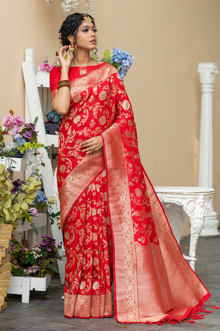 Banarasi Katan silk saree with pure zari weaves, fancy tassels, and a matching blouse piece