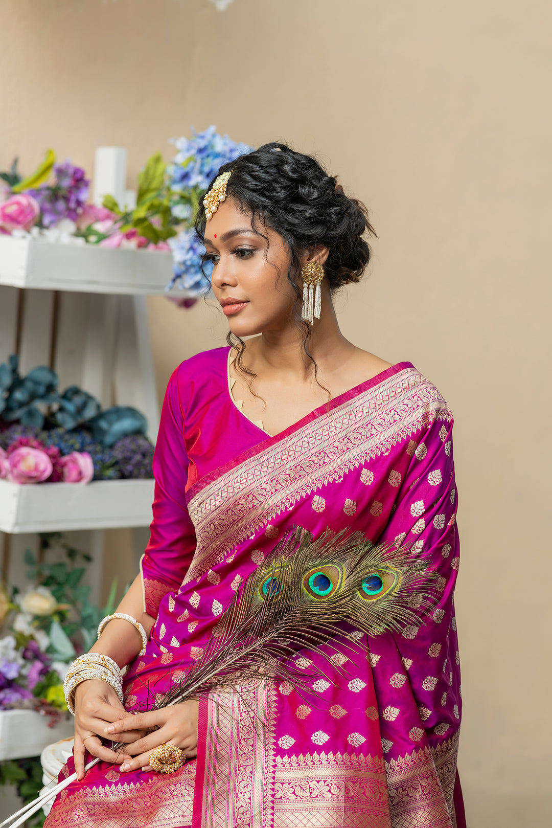 Soft Banarasi Katan silk saree featuring exquisite zari weaves and tassel border