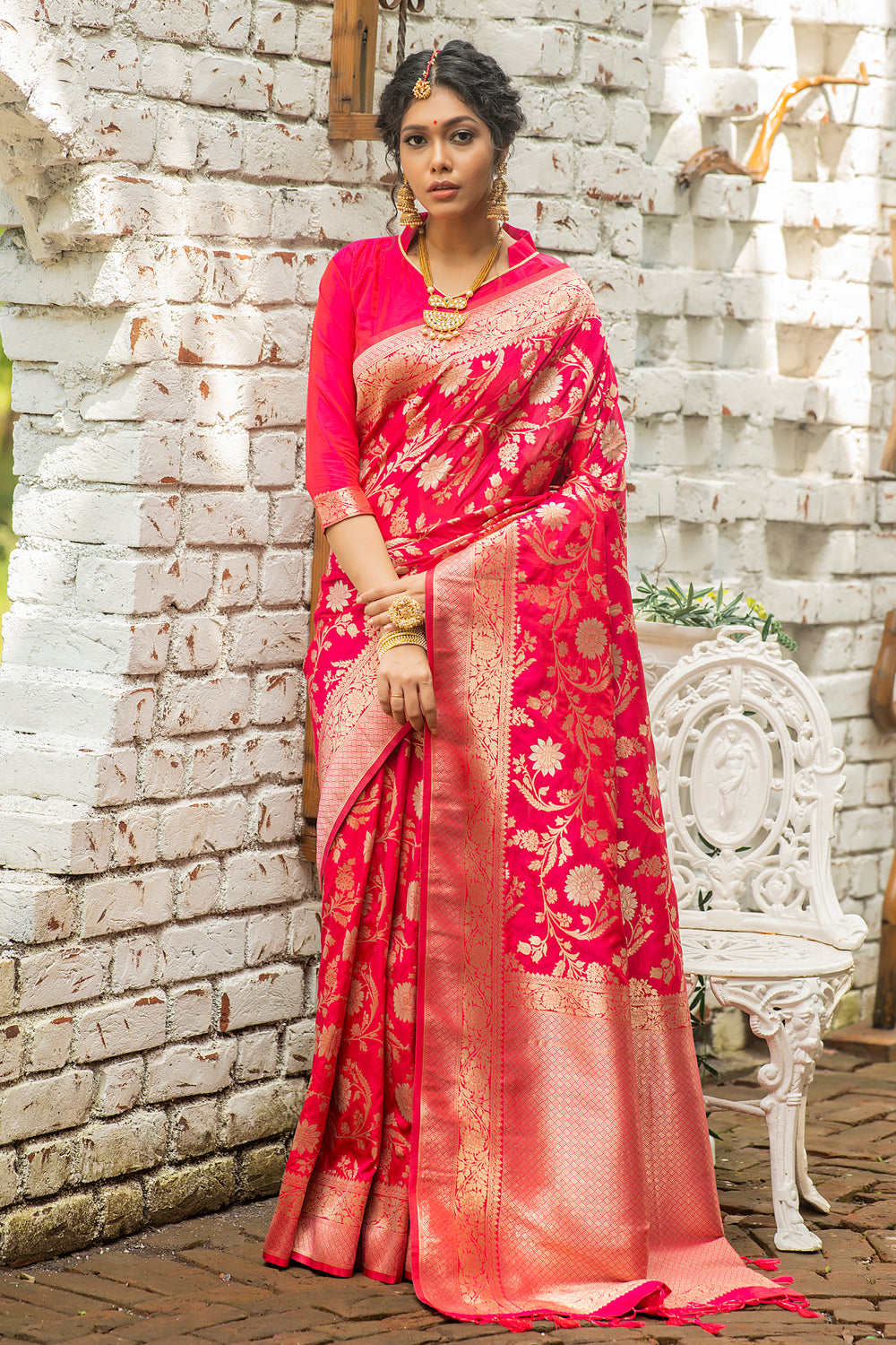 Elegant Banarasi Katan silk saree featuring intricate zari weaving and woven pallu