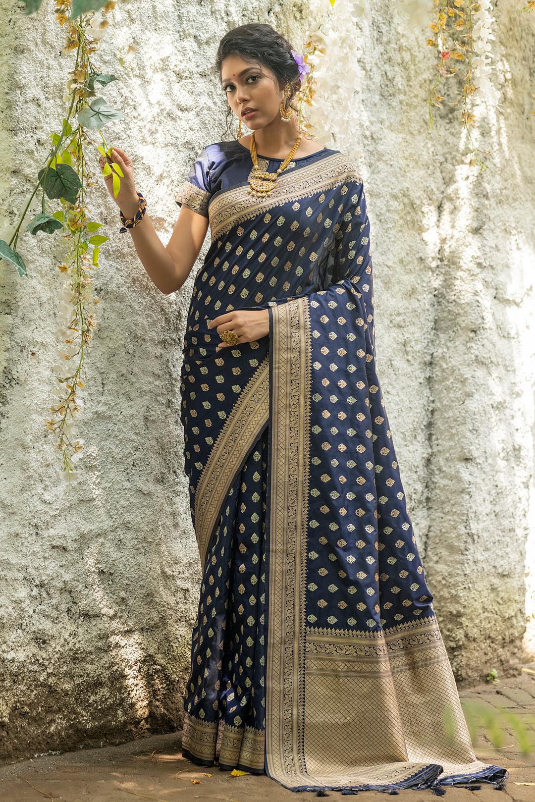 Soft Banarasi Katan silk saree with intricate zari weaving and tassels on the border