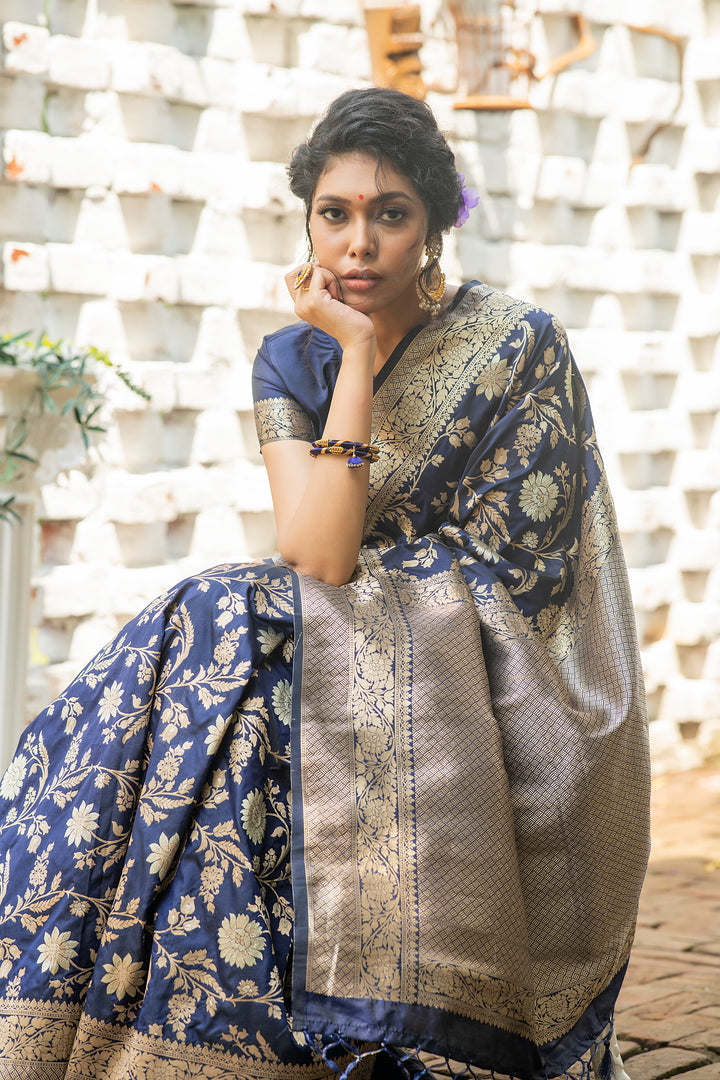 Elegant Banarasi Katan silk saree with intricate zari weaving and matching blouse piece