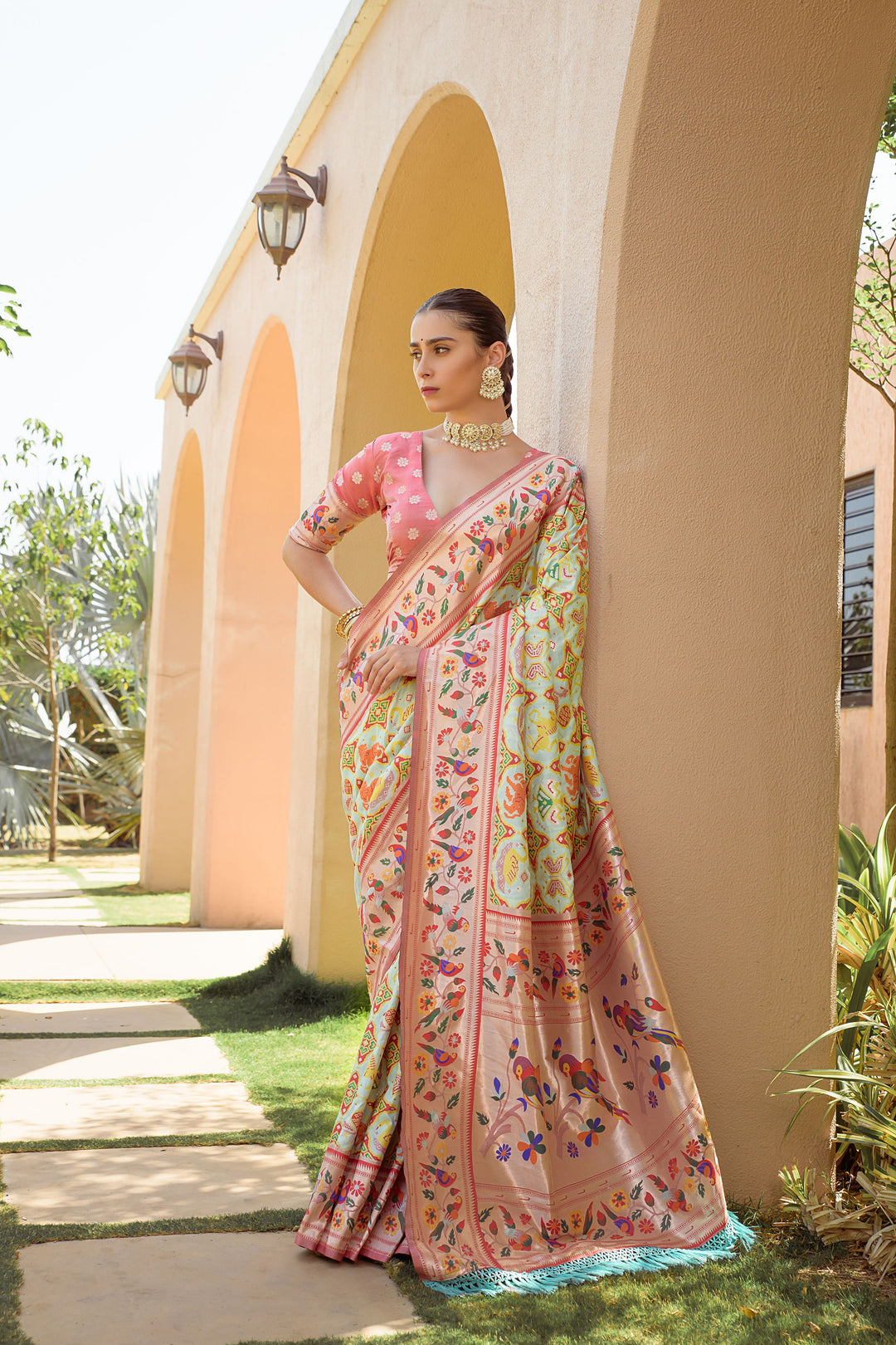 Peach Banarasi soft silk Paithani saree with intricate meena and zari weaving, perfect for Indian wedding celebrations.