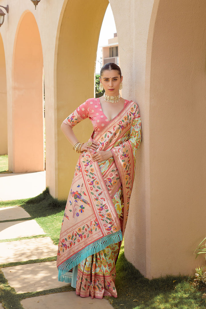 Elegant Peach Paithani Patola saree with a rich pallu, traditional Indian sari for weddings and festive occasions.