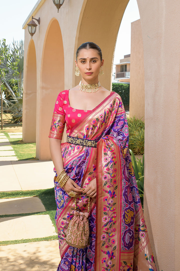 Magenta Indian saadi with a rich pallu, featuring a Paithani Patola design and exquisite meena work.