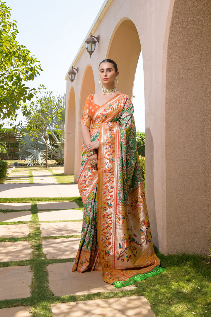 Lime green Indian saree with a beautiful zari and meena design, perfect for weddings and festive cultural events.