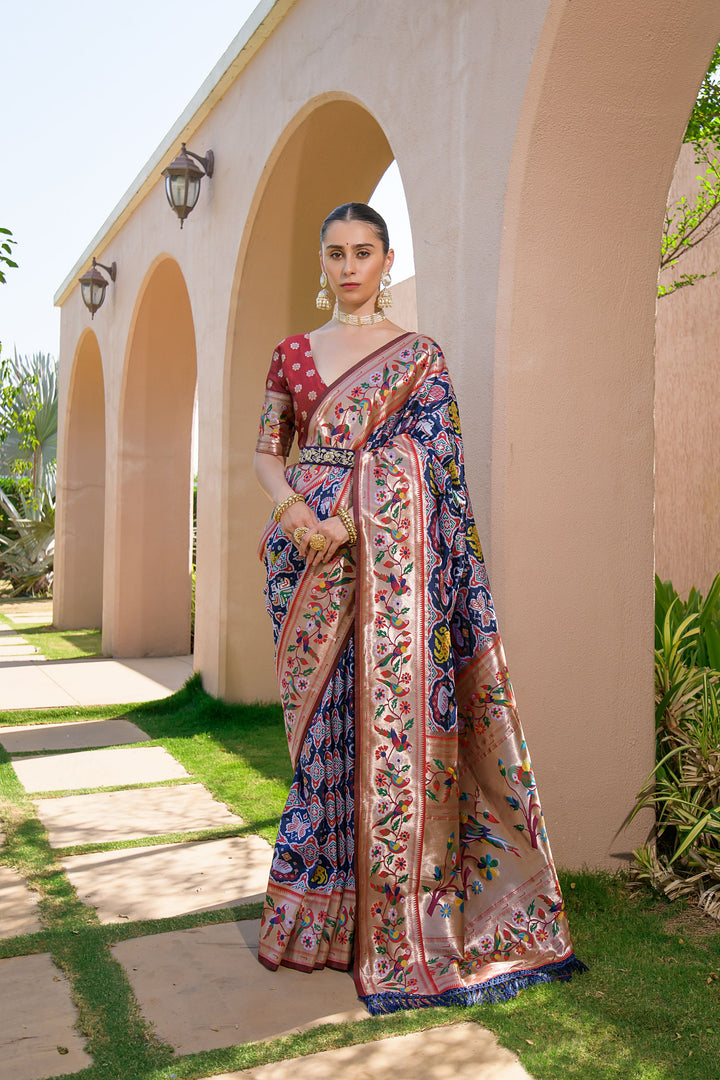 Elegant Navy blue Banarasi soft silk saree with exquisite Paithani weave, ideal for weddings and festive events.