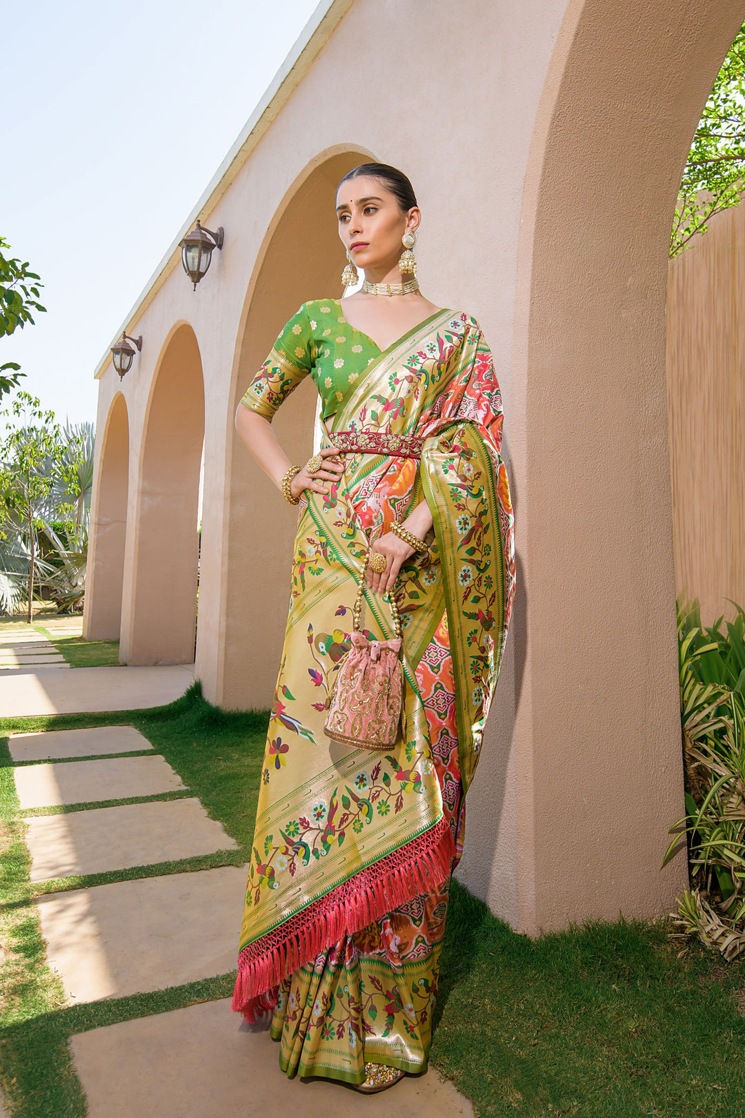 Rich Olive saree with Paithani weave, ideal for making a timeless statement at weddings and cultural gatherings.