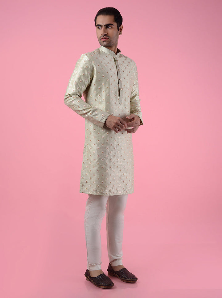 Elegant pista green embroidered kurta pajama for men, designed for cultural and festive wear.