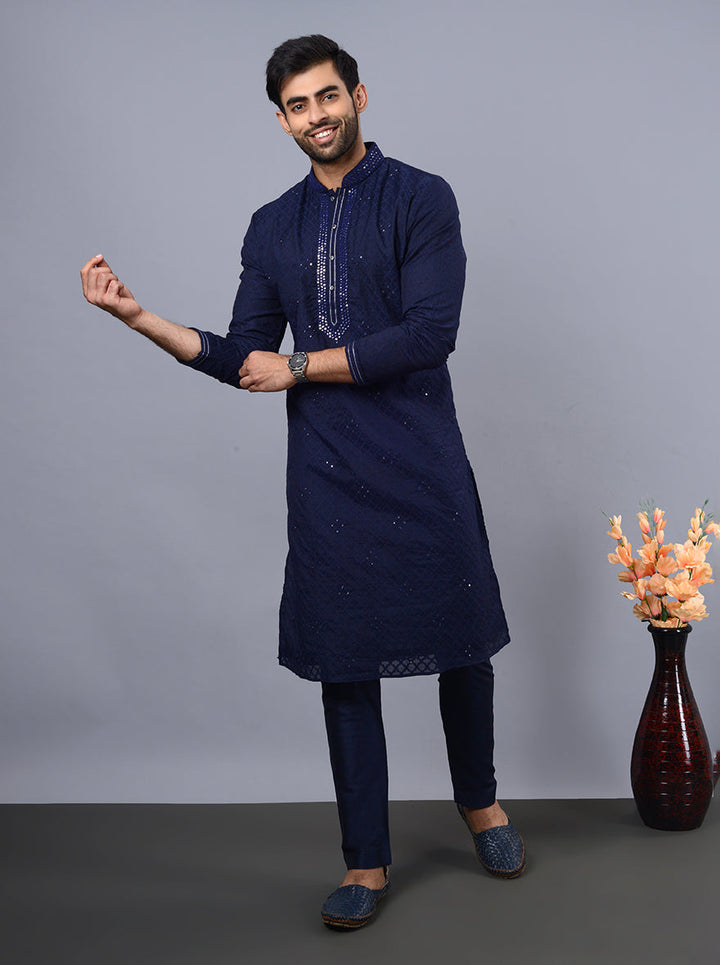 Traditional navy blue kurta pajama, combining charm and modern style.